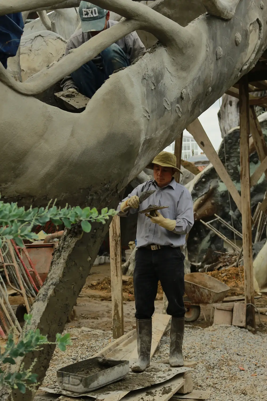 The concrete roots and trunks are shaped by hand.